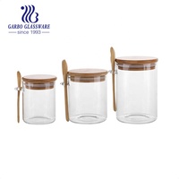 Conteneurs de bonbons alimentaires en forme de cylindre scellé, bocaux de rangement carrés en verre avec couvercle supérieur en bois, paquet de bouteilles en verre, vente en gros, bon marché