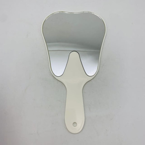 Cosmetico manuale per bocca in plastica con accessori a forma di denti consumabili dentali - Product Image 1