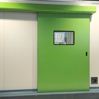 Puertas Corredizas Dobles de Acero con Apertura Lateral, Eléctricas, Modernas, Herméticas y Bien Selladas para Hospitales