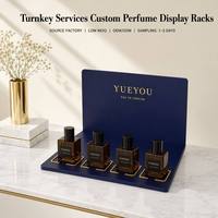 Support de Présentation de Parfums Moderne en Acrylique Bleu Marine en Forme de L, Portable et Démontable, avec 4 Supports Dorés pour Bouteilles de Parfum, Présentoir de Luxe pour Produits de Beauté