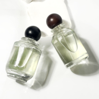 Haute qualité personnaliser bouchon clair plat rond parfum bouteille en verre bouteille d'huile essentielle bouteille de parfum de luxe 100ml