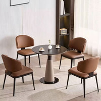 Ensemble table et chaises de salle à manger rondes modernes Yartu avec plateau en ardoise, plateau central rotatif, 6 places, pieds en métal, idéal pour les petites salles à manger.