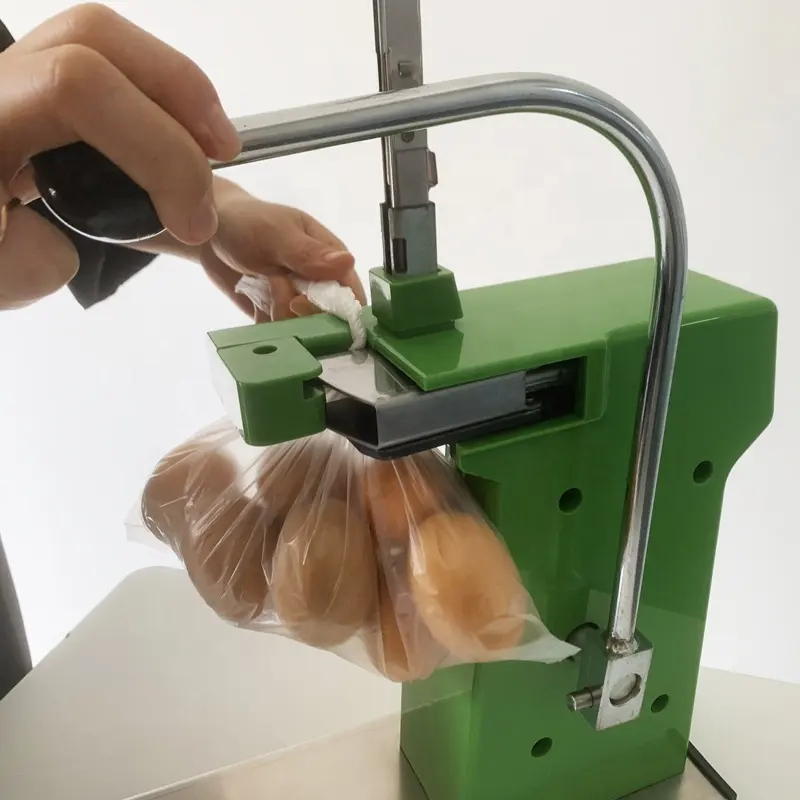 मैनुअल सुपरमार्केट सब्जी फल मांस बैग स्टेपलर प्लास्टिक बैग एल्यूमिनियम नेल क्लिप सीलिंग बांधने की मशीन