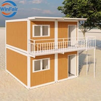 Maisons préfabriquées modernes à deux étages WinFair à bas prix, en kit, avec construction en panneaux sandwich en acier et garantie d'un an