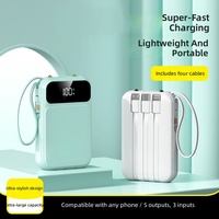 Batterie externe compacte et portable 20000mAh en plastique avec câble intégré, chargeur mobile de qualité cadeau personnalisé, batterie au lithium polymère 10W
