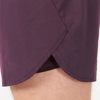 Short de sport personnalisé léger à quatre tissus extensibles taille élastique couleur pure Short en nylon spandex doublé uni pour hommes