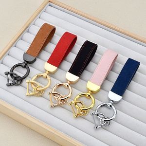 Porte-clés de voiture personnalisé avec logo en relief et gravure laser, en cuir suédé, pour homme, à suspendre à la ceinture, style mode - Product Image 1