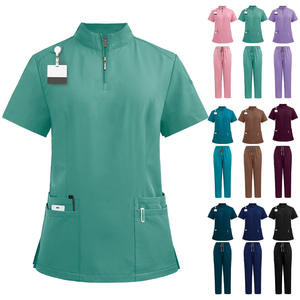 Tenues médicales unisexes Jinteng à manches courtes élastiques – Blouses et chemises pour salons de beauté et hôpitaux – Uniformes hospitaliers en stock - Product Image 1