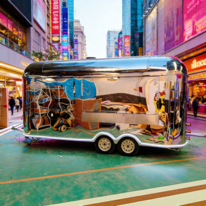 Chariot de vente en acier inoxydable épuré de style Airstream rétro pour la vente de desserts et de boissons avec des roues à roulement fluide - Product Image 3