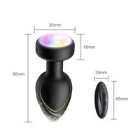 Vente en gros de plug anal en silicone vibrant lumineux sans fil, étanche et écologique, télécommandé, pour hommes, femmes, jouet pour adultes unisexe