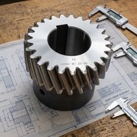 Engrenage hélicoïdal standard forgé en acier allié, haute charge, angle de pression personnalisable, OEM/ODM pour les machines de construction éolienne