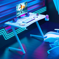 Bureau de jeu en gros pour joueur à bas prix en forme de Z bureau d'occasion à domicile avec porte-gobelet