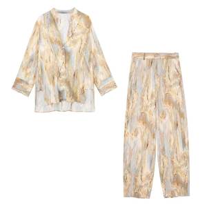 Ingrosso Primavera 2026 Nuova Collezione Abbigliamento Donna Stile Europeo e Americano Camicie Tie-Dye Asimmetriche Pantaloni Dritti a Vita Alta Set Donna - Product Image 1