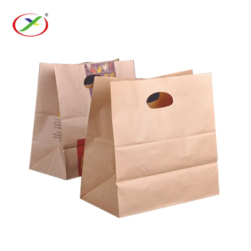 OEM adapté aux besoins du client de poignée de trou de poinçon de papier kraft brun/sac En Papier Kraft à la main sac de transport avec poignée découpée