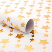 Papier d'emballage cadeau de luxe en feuille d'or épaisse de haute qualité à pois à rayures dessins d'étoiles géométriques estampage à chaud rouleaux d'emballage cadeau de tous les jours
