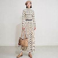 Ensemble deux pièces plissé pour femme, imprimé taches d'encre, haut à col montant et manches longues & jupe longue, style Miyake élégant, vente en gros