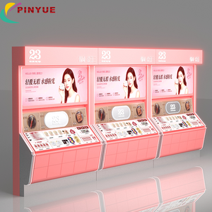 Comptoirs d'exposition muraux personnalisés roses pour cosmétiques avec éclairage LED, vitrine de vente au détail 3 unités pour les zones de test de produits de maquillage et de soins de la peau - Product Image 2