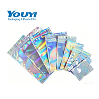 Sacs laser perforés auto-scellants pour bijoux, étuis de téléphone, pochettes holographiques en plastique 7,5*10cm 9*12cm 10,5*15cm 12*20cm 14*20cm