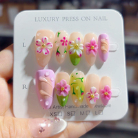 Faux ongles ABS Materia à presser Design d'amande à la main 10 pièces modèle à la mode sculpture de fleurs personnalisée