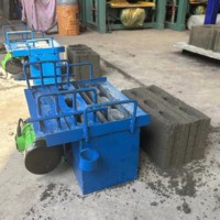 Machine manuelle de fabrication de blocs creux de pavage par emboîtement à pression hydraulique avec ciment, facile à utiliser, pour le Kenya et le Pakistan