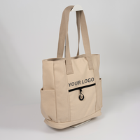 Sac fourre-tout pratique en toile beige avec logo personnalisé et plusieurs poches, grand sac à main spacieux pour le travail, l'école et les voyages avec poche zippée