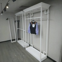 Présentoir suspendu en métal à deux niveaux, détachable, réglable en hauteur, facile à assembler, couleur personnalisable, pour boutique de vêtements