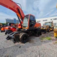 Vente en gros à bas prix, Excavatrice sur pneus d'occasion Doosan DX210W-9C d'origine, 20 tonnes, faible nombre d'heures de travail