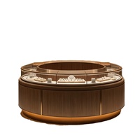 Nouvelle vitrine à bijoux ronde de style chinois avec éclairage LED doux, adaptée aux présentoirs dans tous les types de bijouteries.