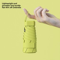 Petit parapluie pliant de protection UV 40% portable compact noir avec boucle d'anneau pour le contrôle manuel de voyage