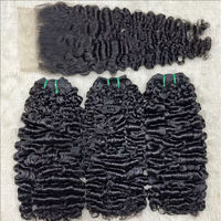 Vente en gros 100% cheveux vietnamiens bruts paquets de cheveux humains bouclés extension vierge naturel rebondissant birman bouclés vendeurs de cheveux bruts