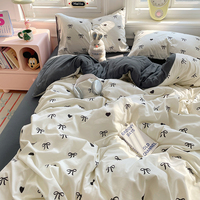 Ensemble de literie en coton lavé avec nœud noir et cœur - Ensemble de literie doux et confortable en 4 pièces pour la chambre des filles