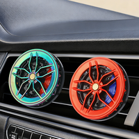 Diffuseur de parfum rotatif pour grille d'aération de voiture, design créatif en forme de moyeu de roue, ornement de parfum pour l'intérieur de la voiture