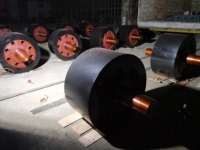 Pièces de four rotatif pour cimenterie robustes : Axe de support de rouleau de trunnion en acier allié sur mesure