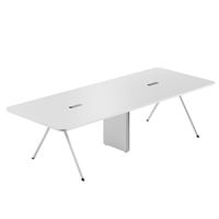 Table de conférence moderne en bois pour 6 personnes avec prises électriques intégrées et gestion des câbles, idéale pour les petites salles de réunion, les hôtels et les bureaux