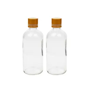Toptan moda 100ML şeffaf şeffaf altın kapaklı cam kuş yuvası içecek şişeleri