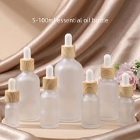 Bouteille d'huile essentielle givrée de 5-100ml, bouteilles de parfum avec couvercles en grain de bois, flacon compte-gouttes pour les yeux