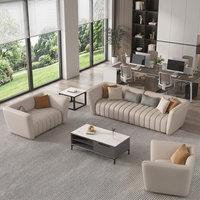 Ensemble de canapés de bureau côtelés crème, mobilier de salon chic pour espaces ouverts avec design vue sur verdure naturelle fraîche