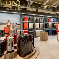 Meubles de magasinage pour bagages personnalisés, unité d'affichage de sacs murale sur mesure, vitrine