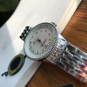 Montre mécanique unisexe de luxe de haute qualité en acier inoxydable, avec index des heures sertis de diamants et cadran en nacre - Product Image 3