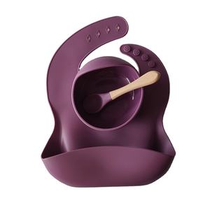 Juego de 3 piezas de silicona: Cuenco con ventosa, cuchara y babero para bebé, cuenco antideslizante que se mantiene en su lugar y cuchara de silicona suave para la primera etapa de alimentación del bebé. - Product Image 1