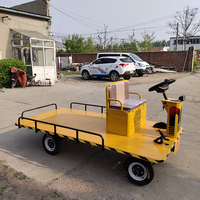 Transpalette plat électrique spécialisé à quatre roues Type de plaque directionnelle pour entrepôt Usine pour chariots à main Chariots