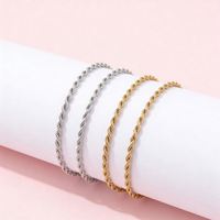 Collier long en chaîne torsadée moderne en acier inoxydable plaqué or 18 carats, élégant