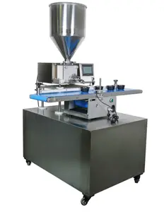 Automatica torta di riempimento injector macchina per la torta o crema processo di rivestimento