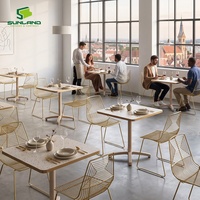 Ensemble de salle à manger Sunland New Style Indoor 3 pièces, chaises en fil d'acier durable avec table pliante en terrazzo pour café, mobilier Horeca