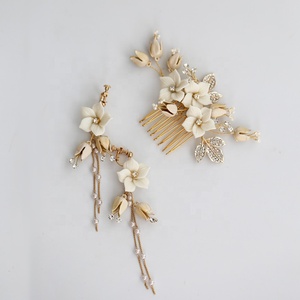 Fancy Small White Clay Flower Gold Leaves High Quality Rhinestone Bridal <strong>Hair</strong> Comb Handmade <strong>Floral</strong> <strong>Hair</strong> <strong>Accessories</strong> for Wedding - Product Image 6