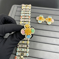 TIANSHE Ensemble 3 pièces de bijoux pour femme : Boucles d'oreilles clous fleurs de glace colorées, Bracelet large et Bague fleur, Accessoires pour banquets