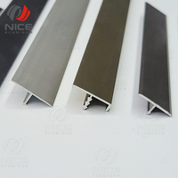 Style moderne 6063 T5 alliage d'aluminium T garniture prix usine OEM ODM carreaux muraux décoratifs profil d'angle de bord