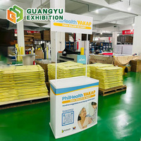 Comptoir promotionnel pliable facile à assembler en ABS, table pour salons professionnels et expositions, stands marketing portables, présentoir en aluminium