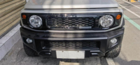 JOP4X4 Grille de pare-chocs avant noire ABS pour Suzuki Jimny Sierra JB64 JB74 JC74 3/5 portes 2019-2024 Accessoires de lettre de nouvel état