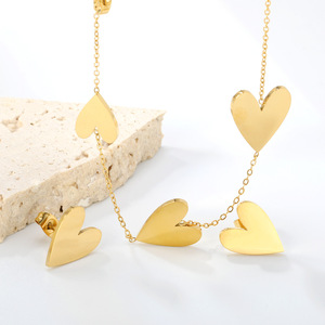Conjunto de joyería de acero inoxidable con forma de corazón para mujer, aretes y collar de moda para fiesta, tono dorado - Product Image 1